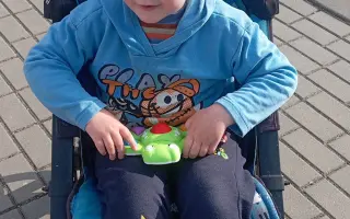 Zdravotní kočárek s podložkou pro Kubíka na každodenní cestování