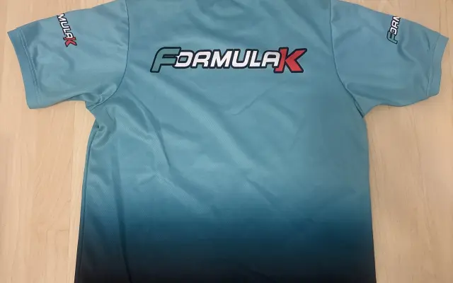 Podepsané tričko teamu